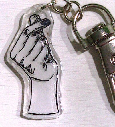 Mano haciendo corazón coreano