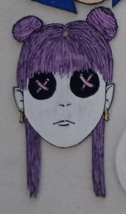 Chica con botones en los ojos